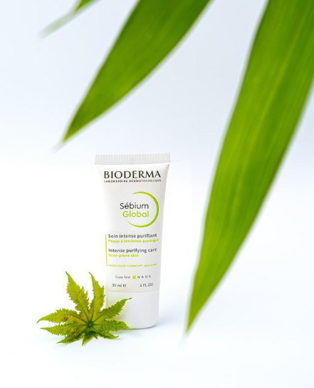 Chair with green fabric and dried flowers